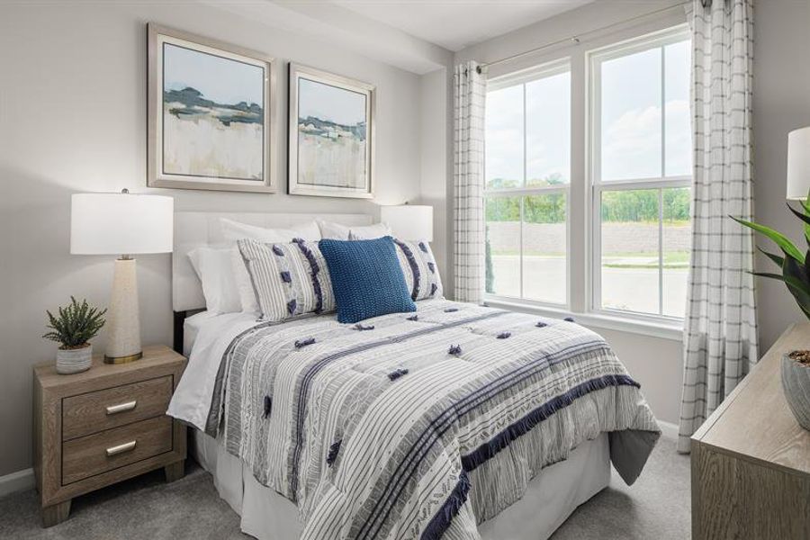 First floor bedroom and bathroom perfect for guests or family.