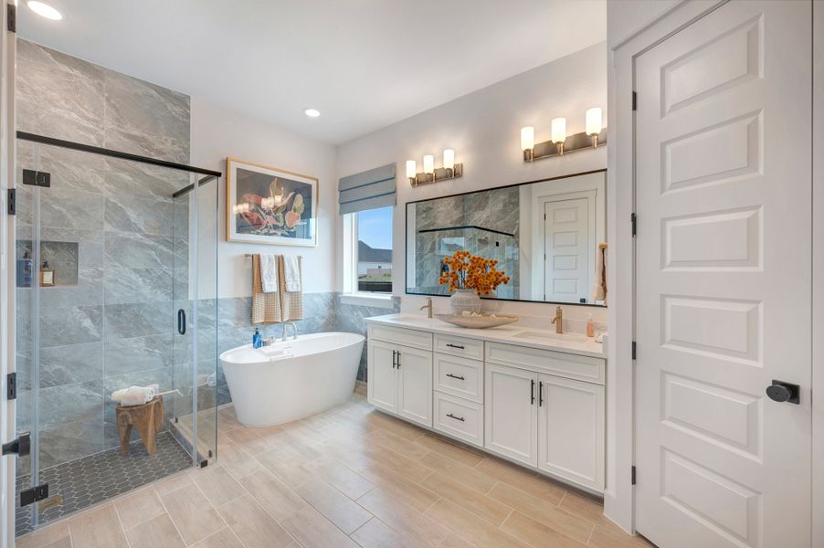 Furnished interior in a model home at Bridgeland Central: Emerald Heights - Enclave Row Collection in Cypress (Image 19).