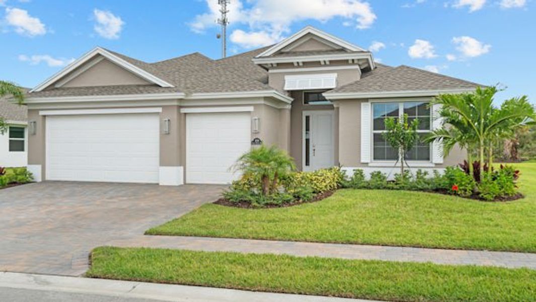 Front exterior of a home in the High Pointe community, located in Vero Beach, FL (Image 60).