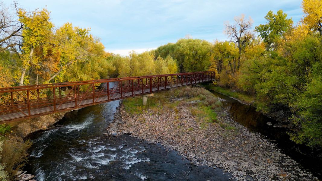 Natural surroundings and green spaces near Sugar Creek in Loveland, CO (Image 7).