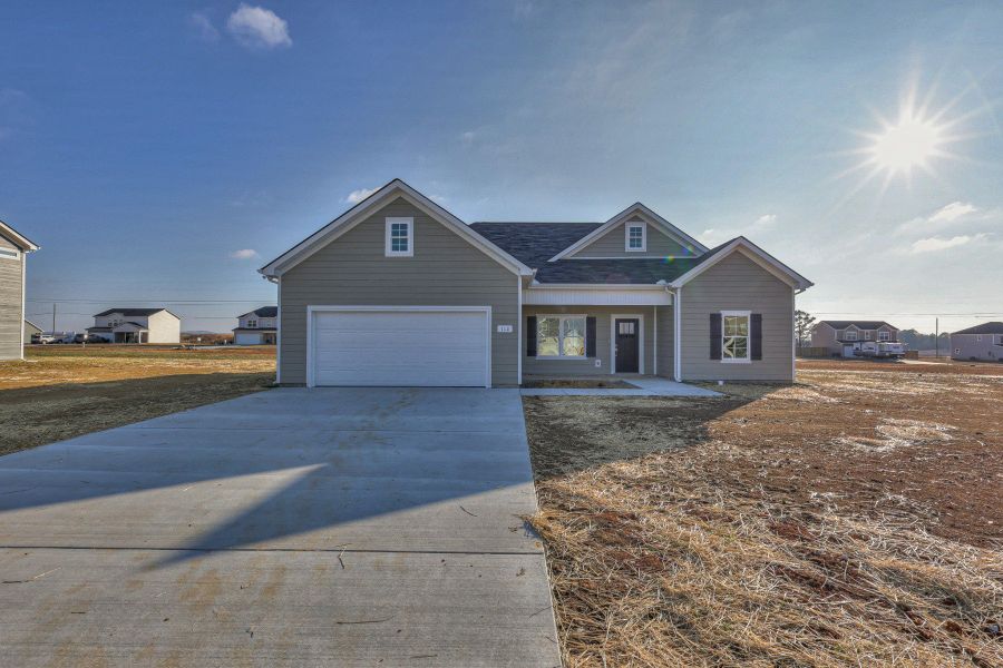 Front exterior of a home in the Collin's Place community, located in Decherd, TN (Image 1).