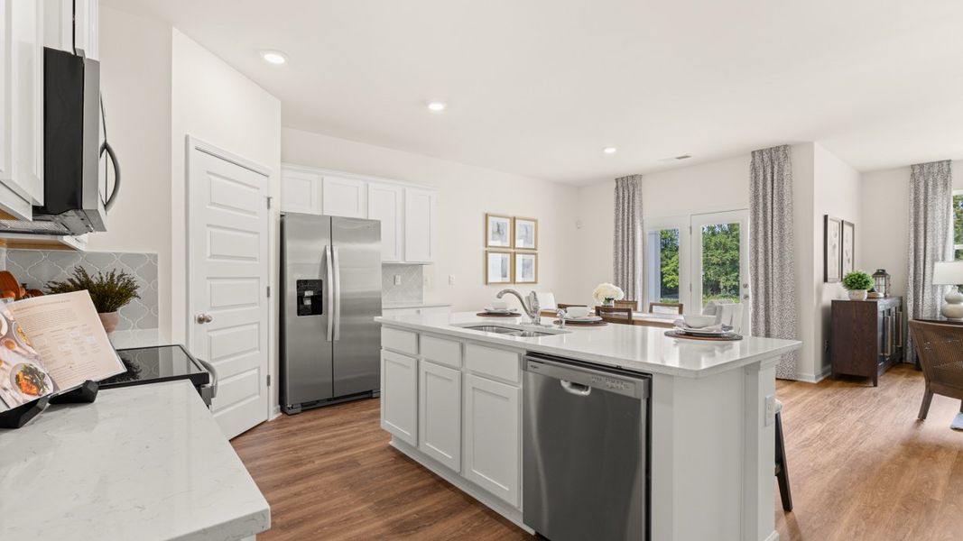 Furnished interior in a model home at Champion's Run in Lithonia (Image 9).