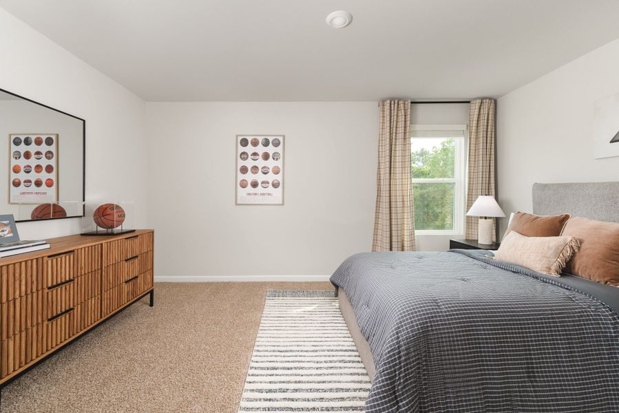 Furnished interior in a model home at The Bluffs At Carey Station in Greensboro (Image 18).