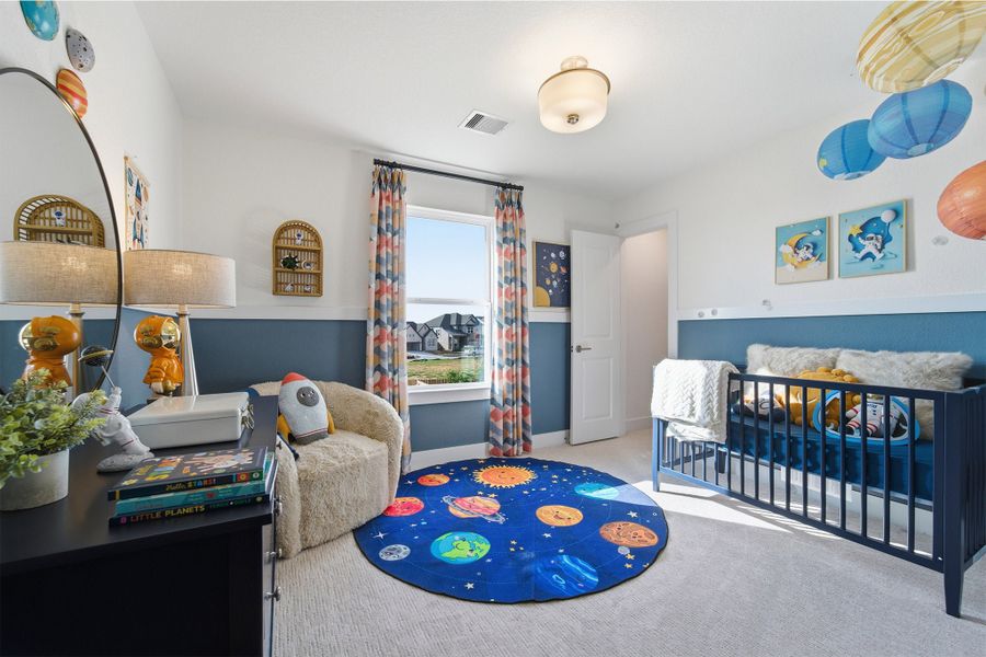 Furnished interior in a model home at Wildrye in Waller (Image 50).