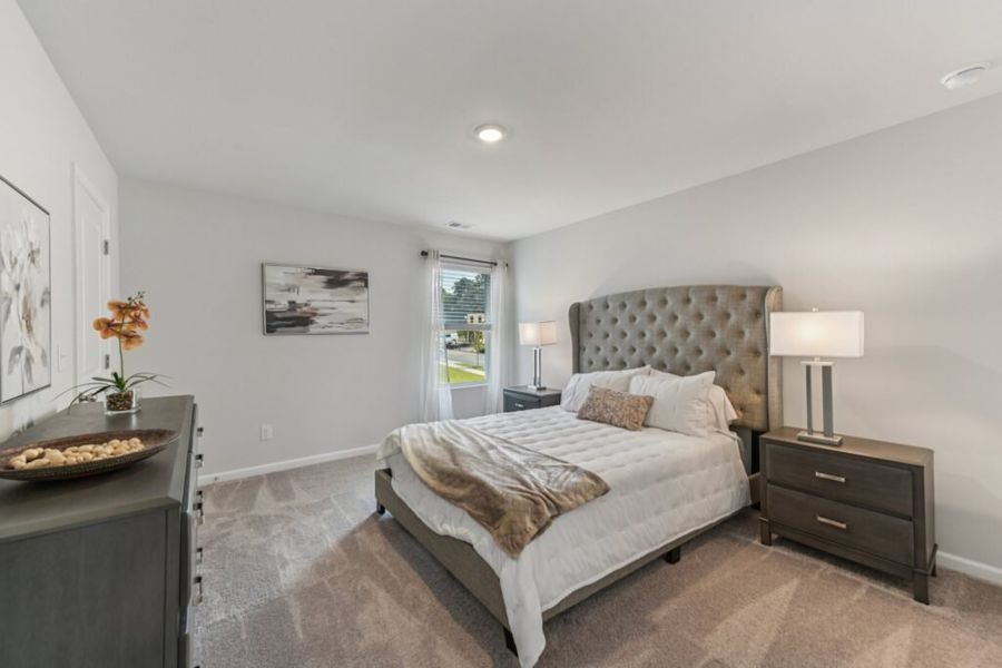 Furnished interior in a model home at The Hills at Cedar Creek in Winder (Image 63).