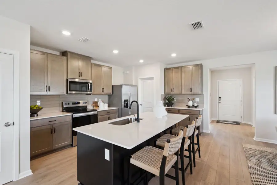 Furnished interior in a model home at Lakeside At Satilla in St. Cloud (Image 4).