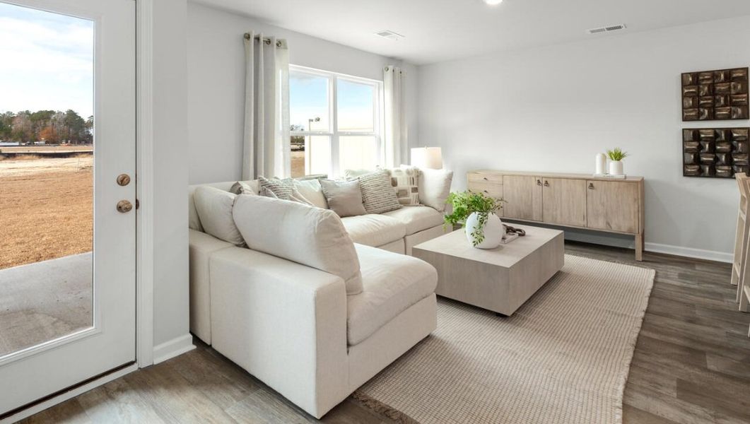 Furnished interior in a model home at Waterside Townhomes in Surf City (Image 12).