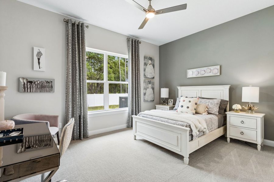 Furnished interior in a model home at Sandy Bluff in Yulee (Image 32).