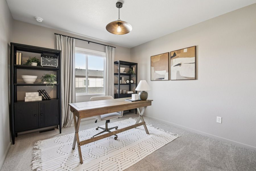 Furnished interior in a model home at Timnath Ranch Townhomes in Timnath (Image 17).