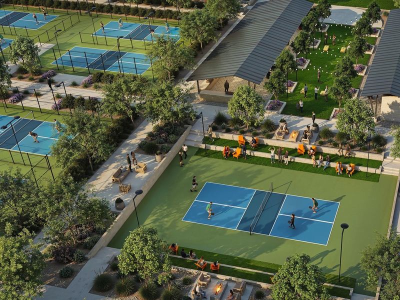 A group of people playing in a swimming pool. A group of people playing in a swimming pool.