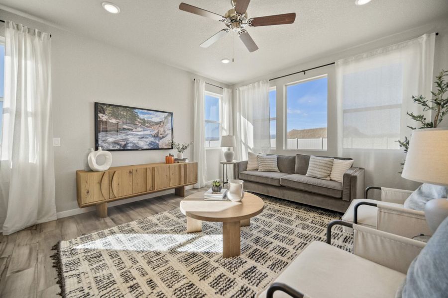 Furnished interior in a model home at Aspen Meadows – Townhomes in Colorado Springs (Image 7). Furnished interior in a model home at Aspen Meadows – Townhomes in Colorado Springs (Image 7).
