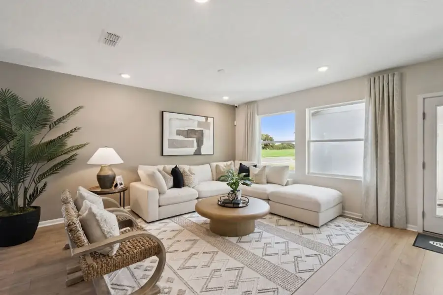 Furnished interior in a model home at Oaks At Kelly Park in Apopka (Image 5).