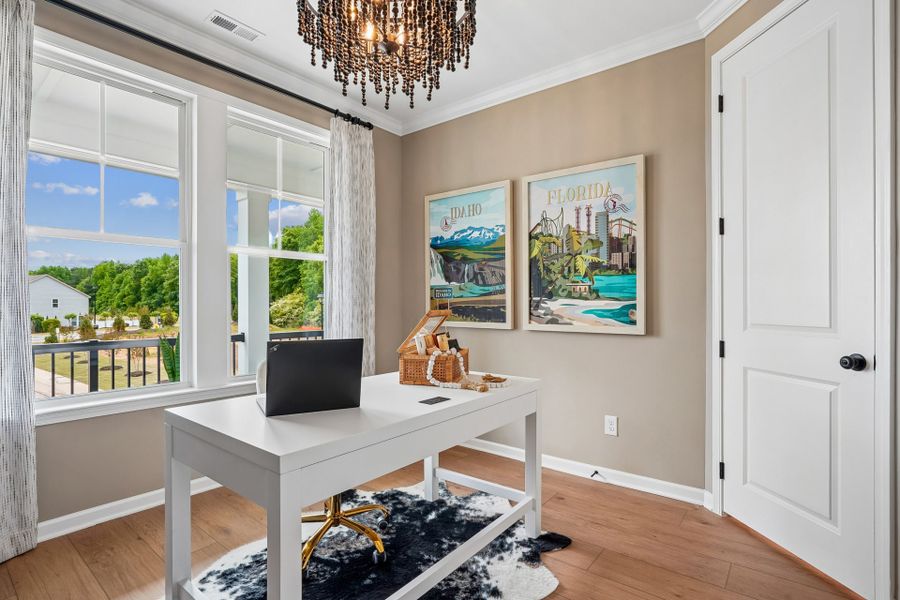 Furnished interior in a model home at South Lake Townes at Flowers Plantation in Clayton (Image 39).