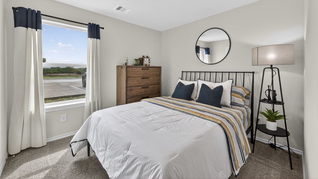 Furnished interior in a model home at The Hills of Sherman in Sherman (Image 33).