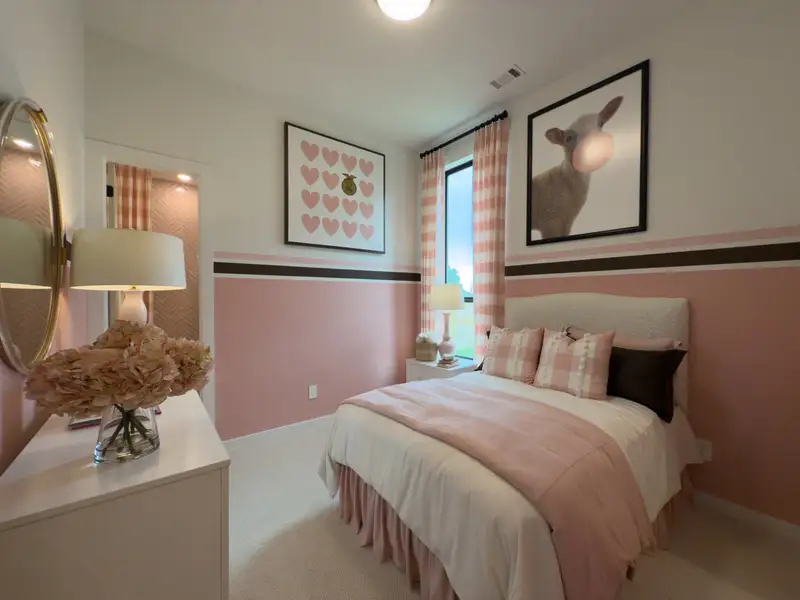 A cozy bedroom with pink accents, heart art, and a whimsy portrait. Warm lighting and soft textures create a serene atmosphere. A cozy bedroom with pink accents, heart art, and a whimsy portrait. Warm lighting and soft textures create a serene atmosphere.