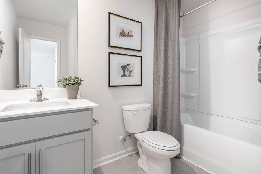 Furnished interior in a model home at Wellington in Browns Summit (Image 31).