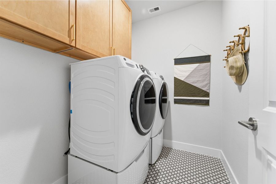 Furnished interior in a model home at Sundance Cove in Crosby (Image 44).