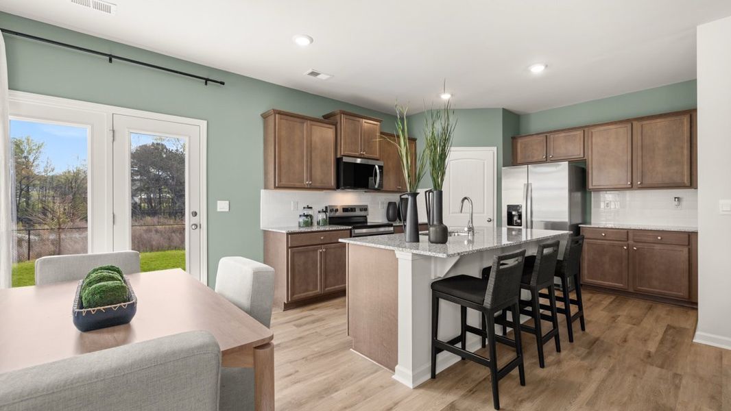 Furnished interior in a model home at Carlton in Douglasville (Image 7).