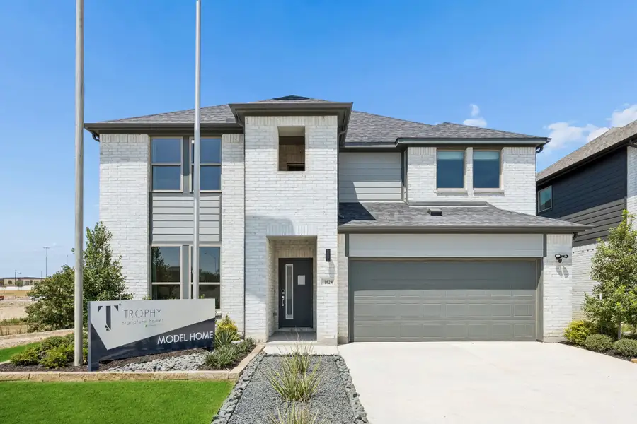 Front exterior of a home in the Cibolo Hills West community, located in Fort Worth, TX (Image 4).