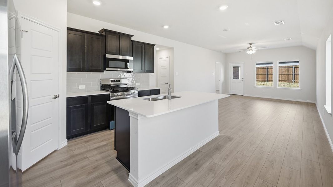 Furnished interior in a model home at Windchime in Celina (Image 3).