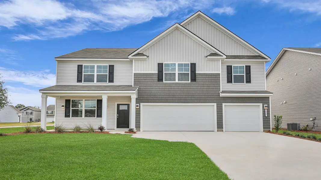 Front exterior of a home in the Carolina Groves community, located in Moncks Corner, SC (Image 2).