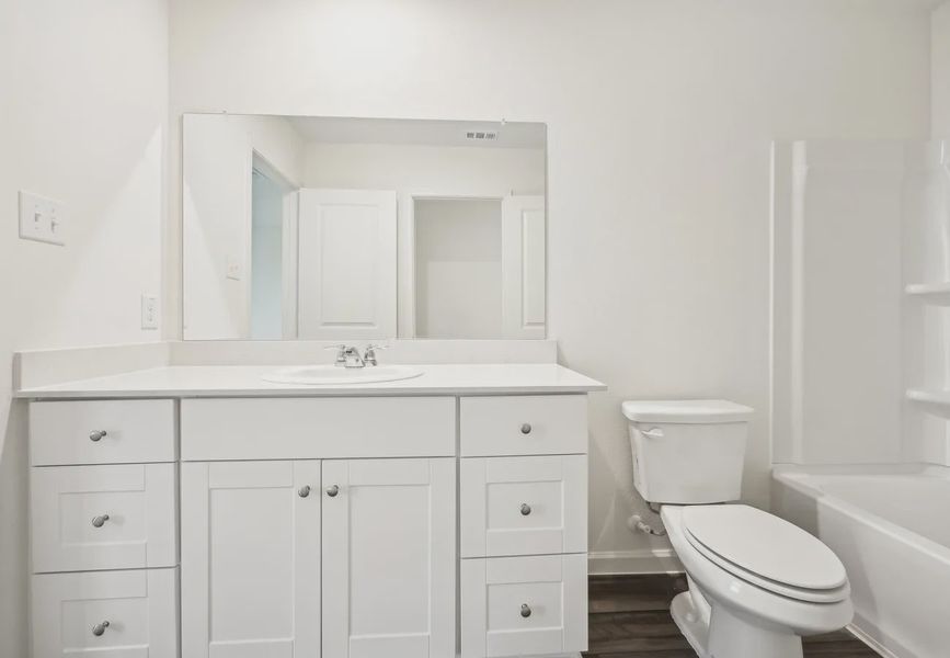 Furnished interior in a model home at Roosevelt Heights in San Antonio (Image 18).