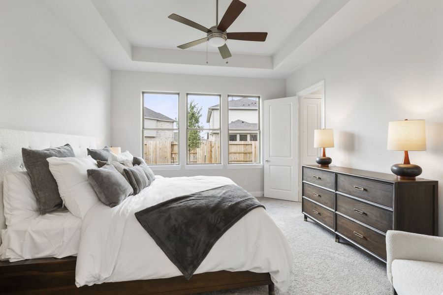 Furnished interior in a model home at Sunterra in Katy (Image 27).