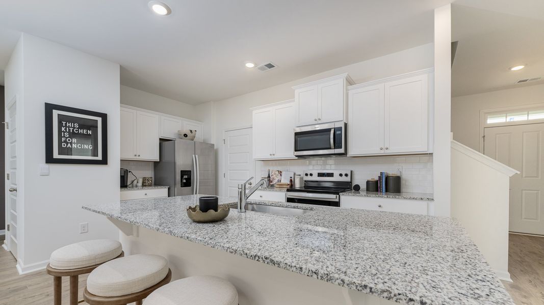 Furnished interior in a model home at Sherwood Manor in College Park (Image 9).