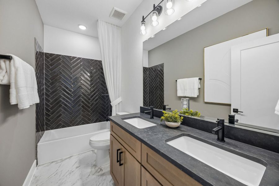 Furnished interior in a model home at Mavera in Conroe (Image 17). Furnished interior in a model home at Mavera in Conroe (Image 17).