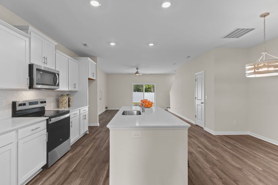 Furnished interior in a model home at The Knoll at White Oak in Garner (Image 13).