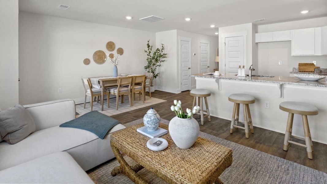 Furnished interior in a model home at Waterside Townhomes in Surf City (Image 18).