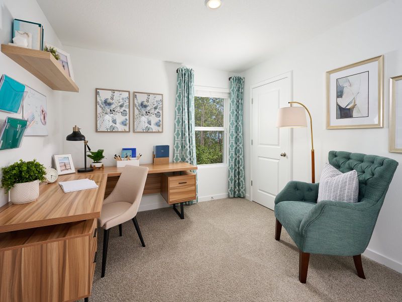Furnished interior in a model home at Flagler Village - Classic Series in Palm Coast (Image 9).