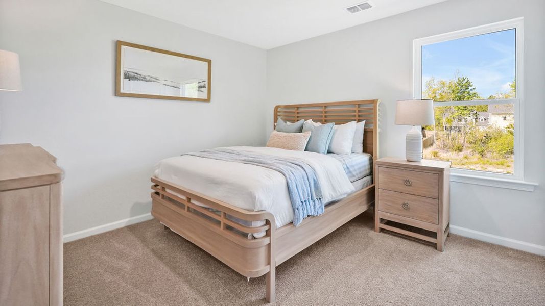 Furnished interior in a model home at Patriot Pointe at Towne Pointe in Jacksonville (Image 27).