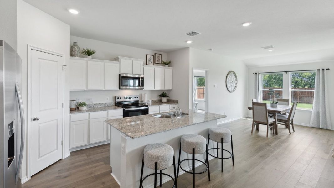 Furnished interior in a model home at Corsicana Commons in Corsicana (Image 1).