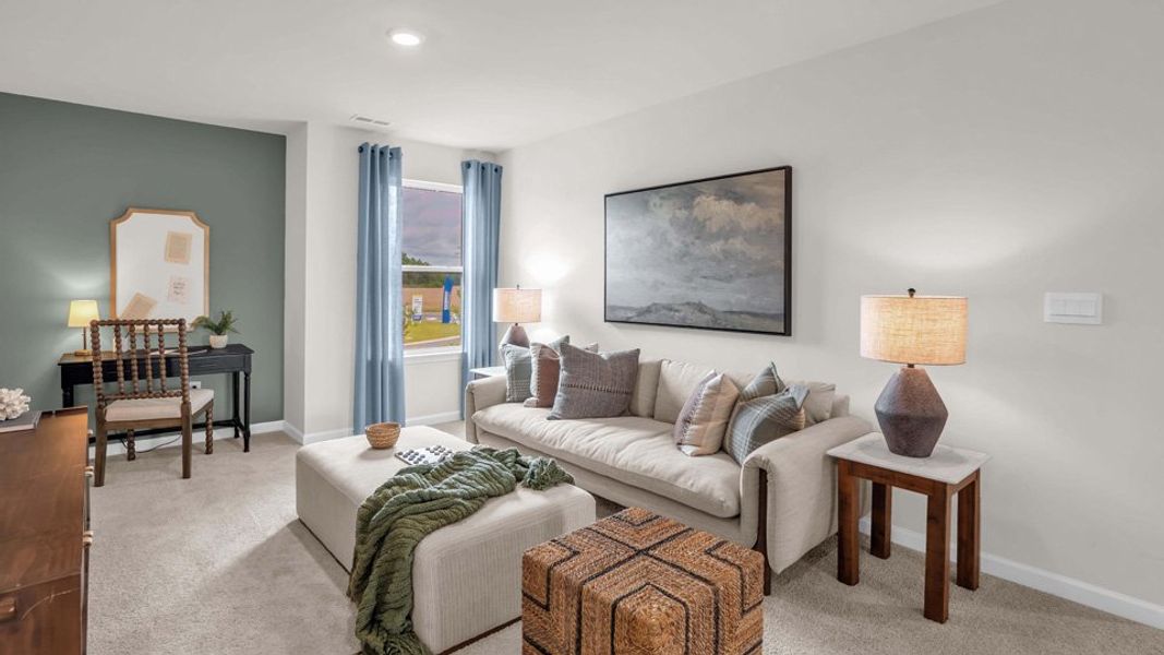 Furnished interior in a model home at Shahbain Reserve in Raeford (Image 16).