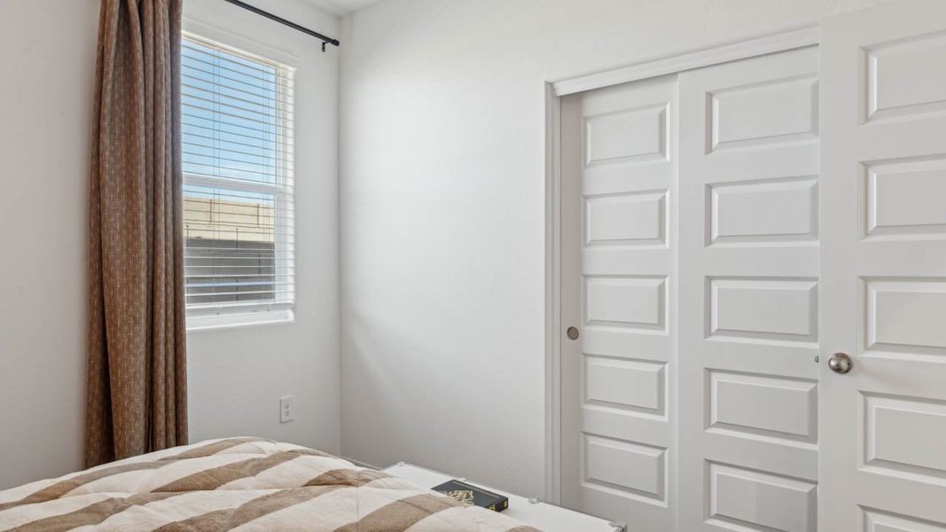 Furnished interior in a model home at Elena Trails in Maricopa (Image 19).