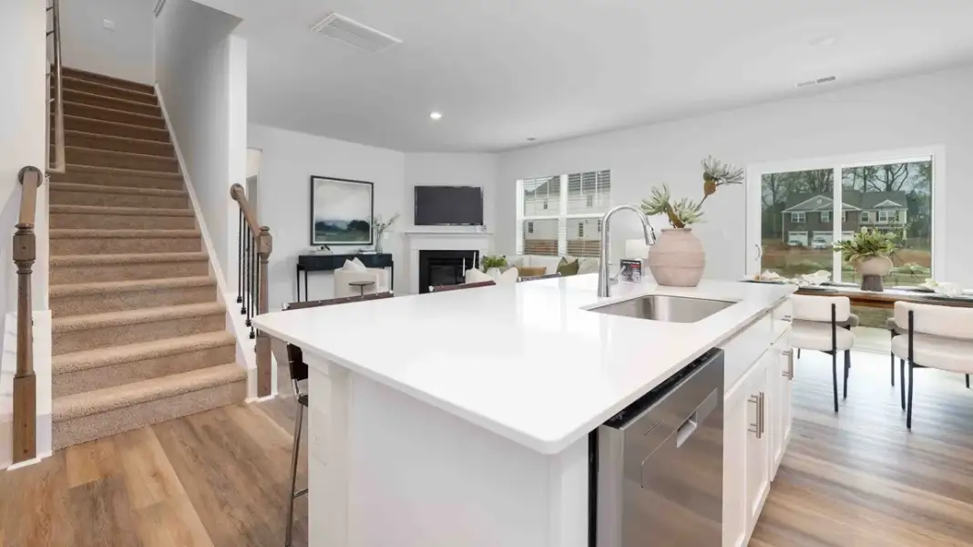 Furnished interior in a model home at Sweetwater Village in Rockwell (Image 9).