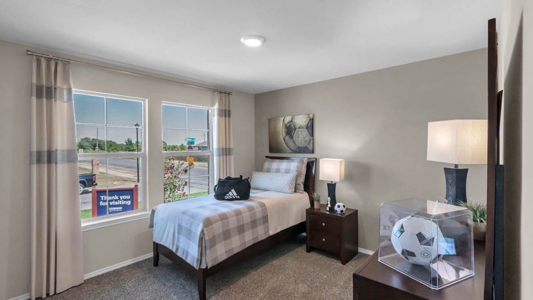 Furnished interior in a model home at Park Meadows in Lorena (Image 3).