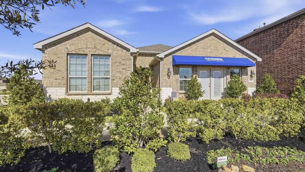 Front exterior of a home in the The Woods at Lindsey Place community, located in Anna, TX (Image 16).