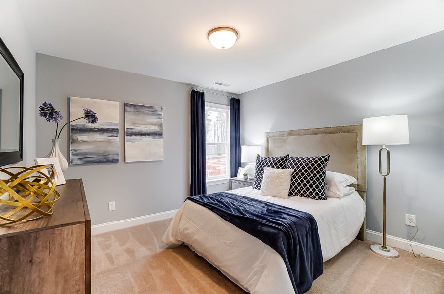 Furnished interior in a model home at Bellevue Townhomes in Greenville (Image 8). Furnished interior in a model home at Bellevue Townhomes in Greenville (Image 8).
