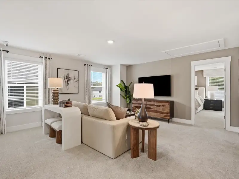 Furnished interior in a model home at Crossing at Abner Creek in Greer (Image 9).