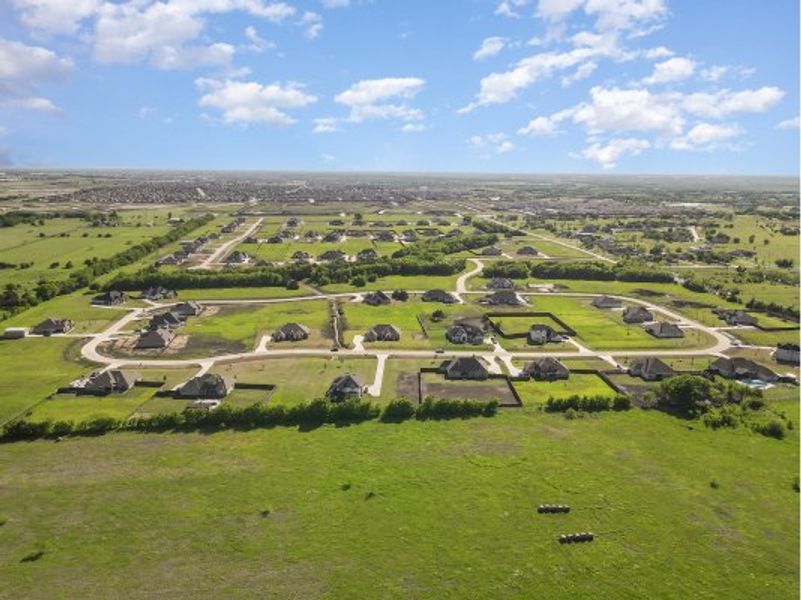 Aerial view of the Lynx Hollow Estates community in Forney, TX, showing layout and nearby surroundings (Image 12).