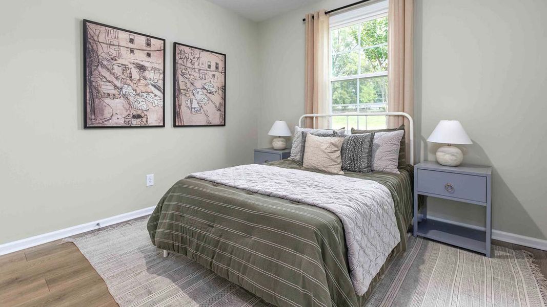 Furnished interior in a model home at Quarry Hills - Freedom in Swepsonville (Image 18).