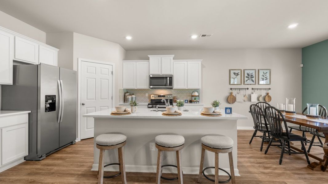 Furnished interior in a model home at Twin Lakes in Hoschton (Image 42).