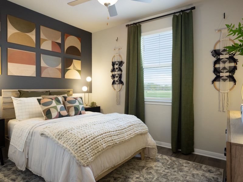 Furnished interior in a model home at Opal Meadows in Kyle (Image 18).