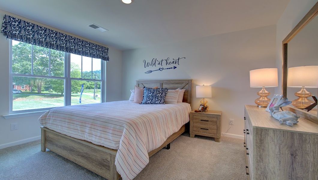 Furnished interior in a model home at Patton Cove in Clyde (Image 9).