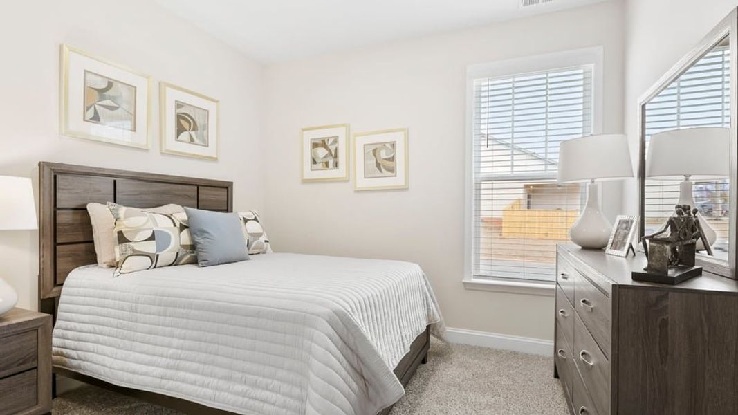 Furnished interior in a model home at Ravencrest in Roebuck (Image 19).