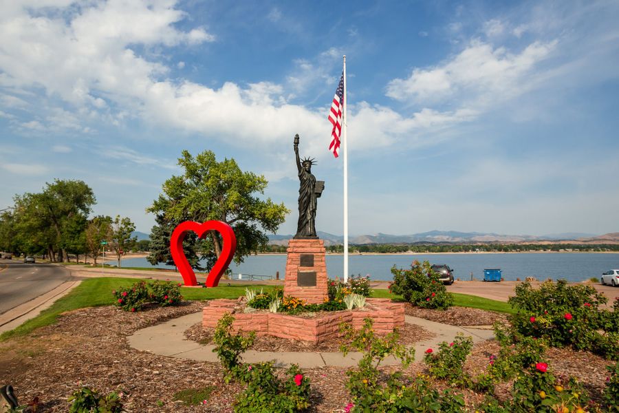 Entrance to the The Lakes at Centerra community in Loveland, CO, featuring signage and landscaping (Image 13).