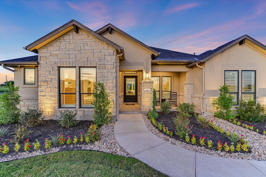 Front exterior of a home in the Scofield Farms Estates community, located in Georgetown, TX (Image 10).
