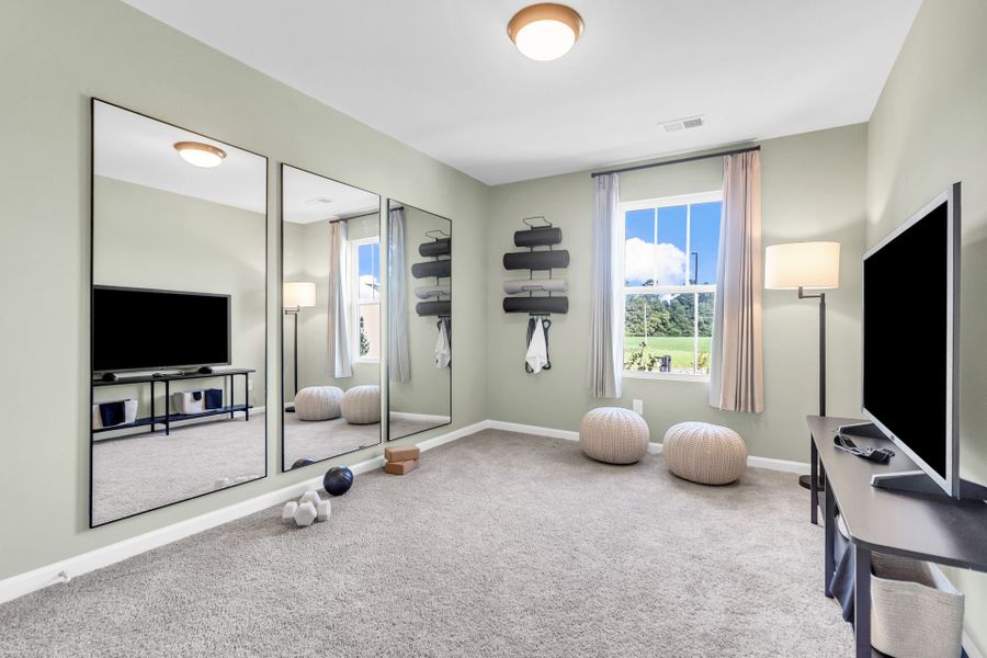 Furnished interior in a model home at Reeves Crossing in St. George (Image 18).